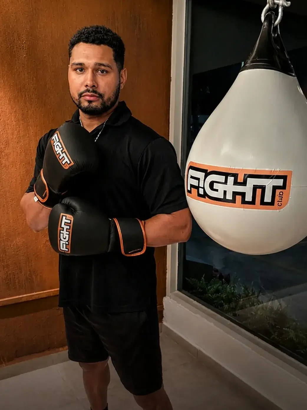 Kevin, boxing coach at F!GHT BOX, gloved and ready for F!GHT Precision mitt work in Condado, San Juan